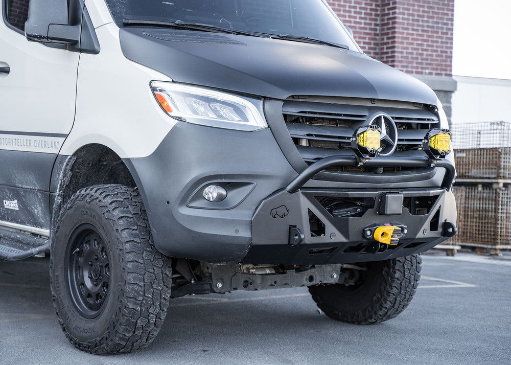 Side profile of a Mercedes-Benz Sprinter van showcasing the ROAMBUILT LoPro Front Bumper, highlighting its lightweight aluminum shell, integrated bull bar, and seamless fit that adds only 3 inches of bulk, aligning perfectly with the vehicle's body lines.