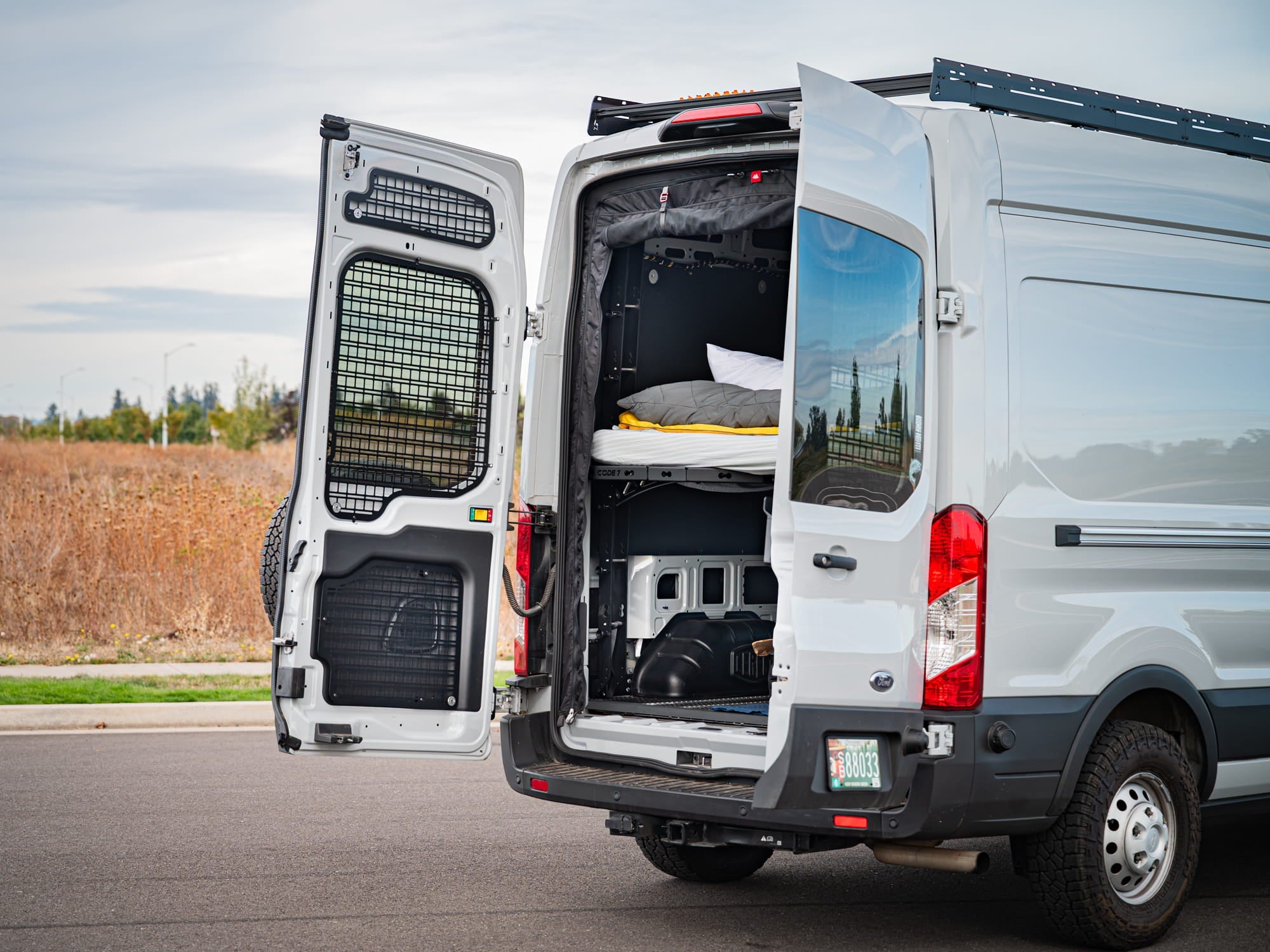Transit Rear Door Molle Panels installed in Transit 148" camper van