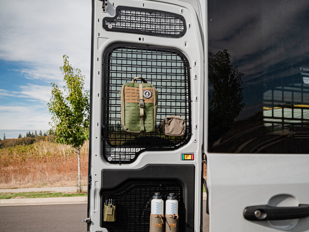 Transit Rear Door Molle Panels installed with molle bags and molle mounts attached
