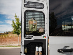 Transit Rear Door Molle Panels installed with molle bags and molle mounts attached