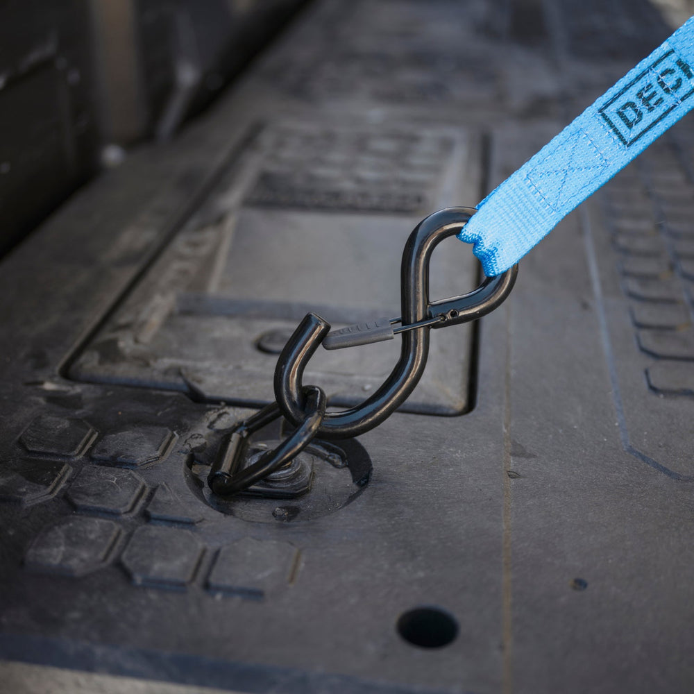 [XS4G, XF7G, XG9G] A ratchet strap attached to one of the Drawer System's D-ring Tie Downs.